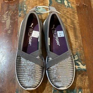 Puma Gray slip on shoes.